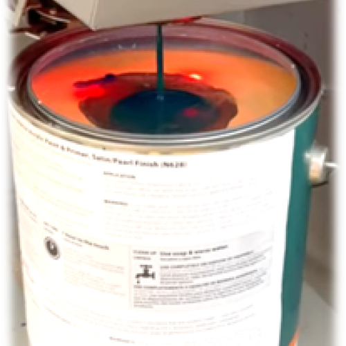 Automatic paint dispenser adding colorants to base paint before using a paint shaker or vortex mixer to ensure even mixing, demonstrating why mixing paint is essential for consistent color.
