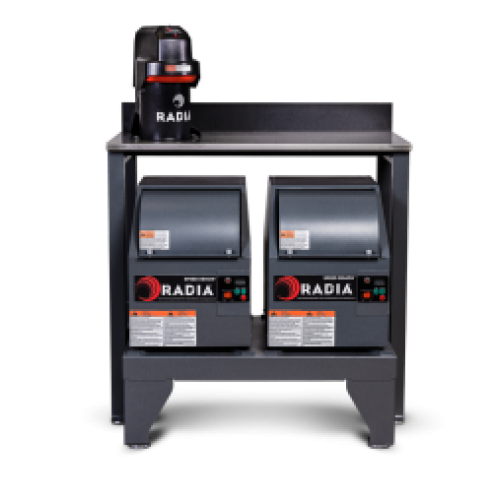 A front-facing view of a RADIA paint mixing workstation featuring two gray automated mixing units side by side, with labeled control panels, mounted on a heavy-duty metal stand.